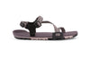 Dusty Rose Z-Trail - flat gray-pink sport sandal with paler pink treads on the bottom. This colourway features gray-pink z-shaped strapping at the front and an adjustable ankle strap at the back. Two black slide buckles are shown at the side of the sandal.