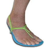 Foot in Blue Xero Barefoot Shoe with hot green laces