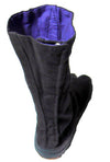 view from the back of one tall black tabi boot