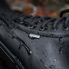 Close up of water beading up on Lems Waterproof Boulder Boot in Shadow