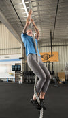 Woman climbing a rope wearing Asphalt 360 Minimal Cross-Trainers