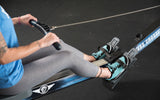 Woman using a Crossfit Rower wearing a pair of Blue Yellow 360 Minimal Cross-Trainers