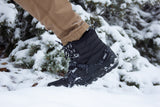 Alpine Minimalist Snow Boot for men Black being worn in the snow