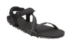 Z-Trail in black - flat black sport sandal with z-shaped strapping at the front and an adjustable ankle strap at the back. Two black slide buckles are shown at the side of the sandal