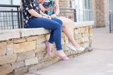 2 people wearing their Knit Phoenixes, one in Cream Colour Knit with bare legs and one with Rose colour with Skinny Jeans