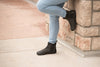 Wearing Tari-Minimal Leather Chelsea Boot Black Pair with light blue jeans