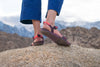 Feet in Magenta style Z-Trails on rocky hilltop