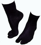 pair of black stretchy tabi ankle socks on feet