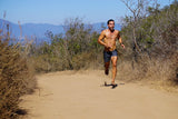 Man running in Earth Runners